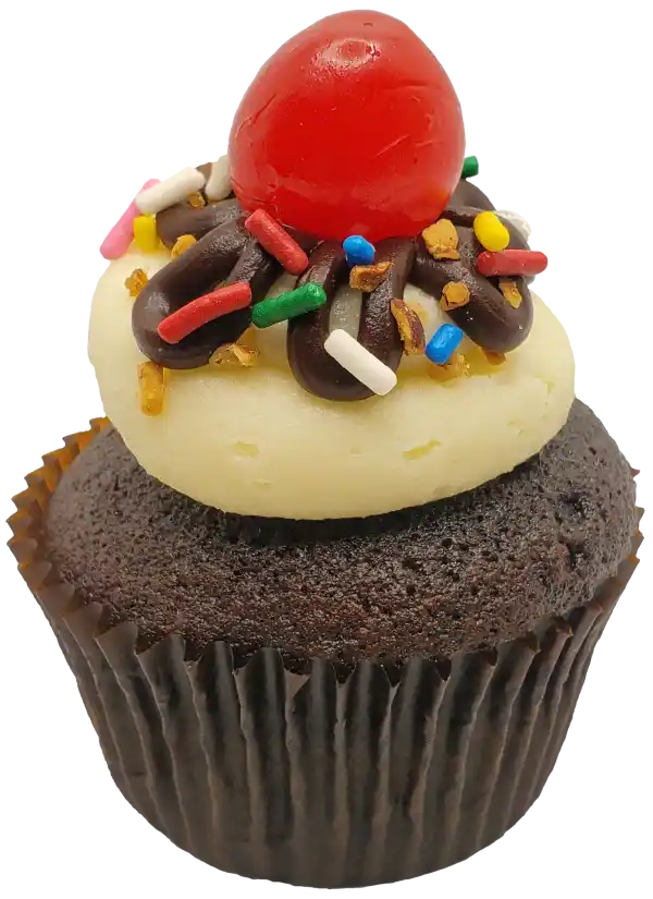 Hot Fudge Sundae Cupcake Toronto Cupcakes Hot Fudge Sundae cupcake with vanilla frosting, sprinkles, hazelnuts, chocolate ganache, and a maraschino cherry