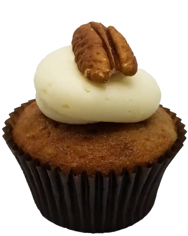 Humming Bird Cupcake Toronto Cupcakes Humming Bird cupcake with cream cheese frosting and a roasted pecan